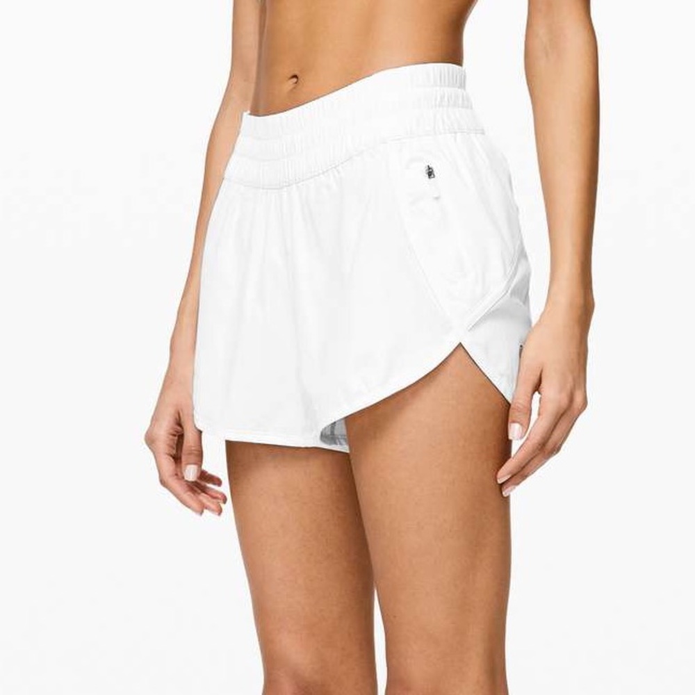 white lululemon 4” tracker shorts